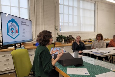 A CCAHA Preservation Services team member leading a presentation on preservation planning