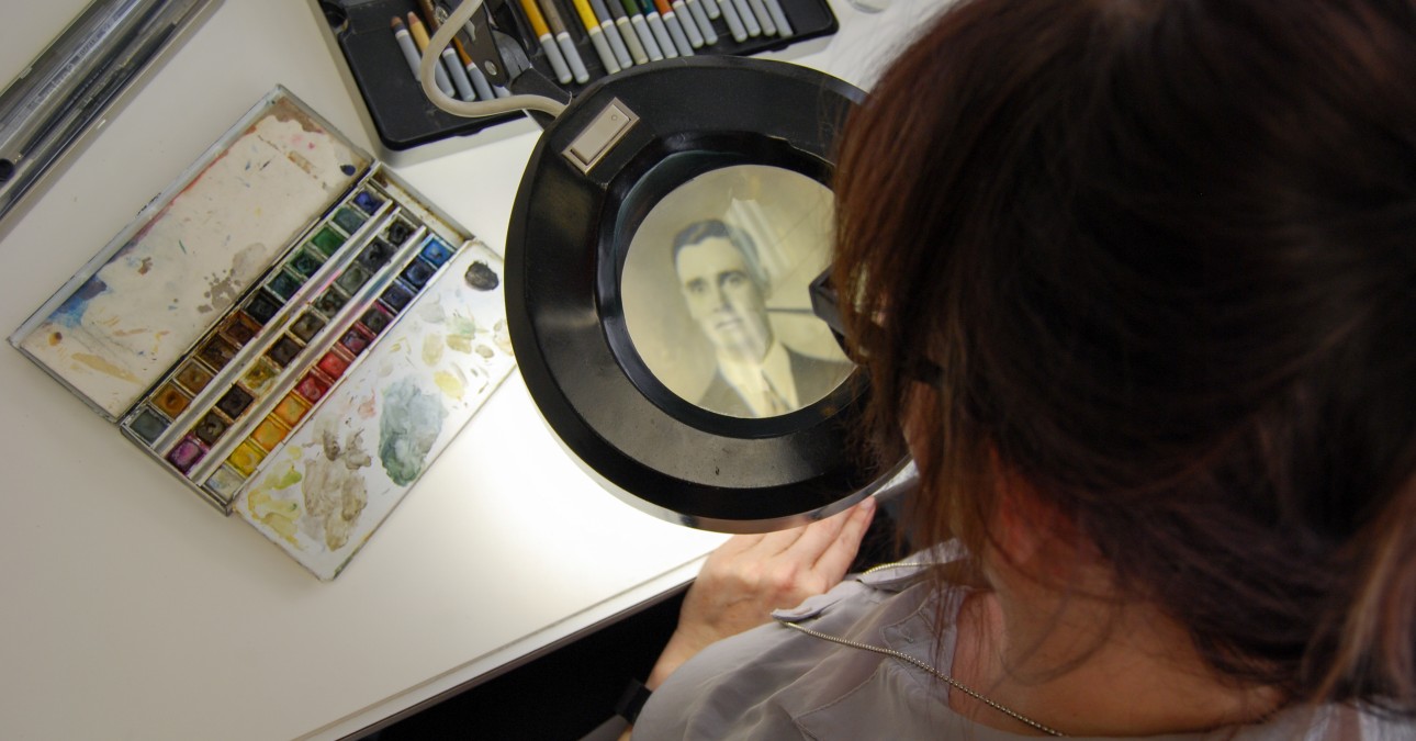 Inpainting a photograph with a magnifier